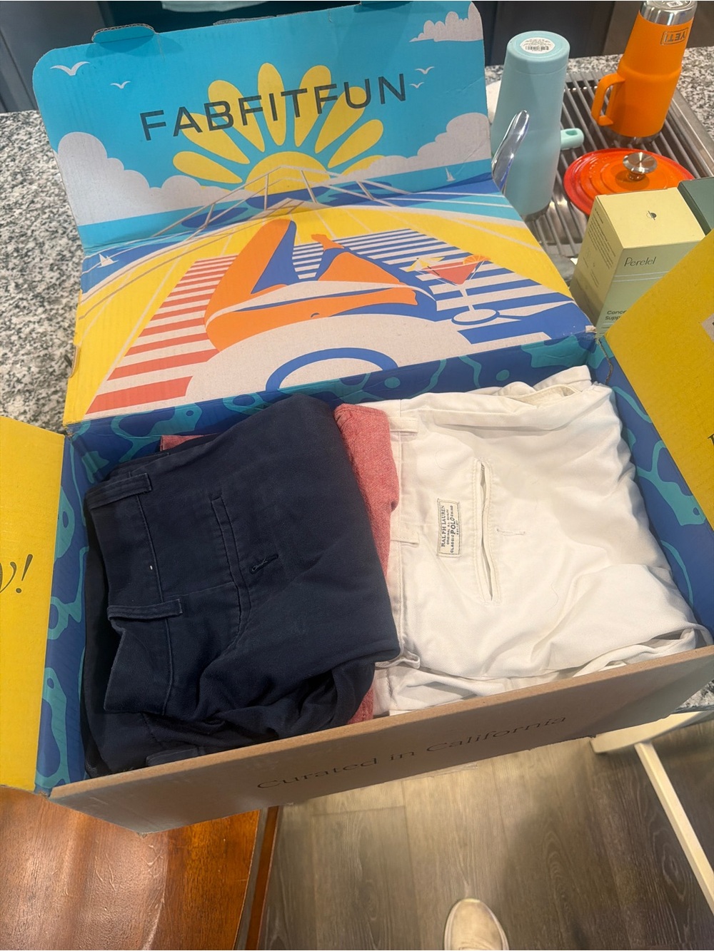 Box of men’s shorts